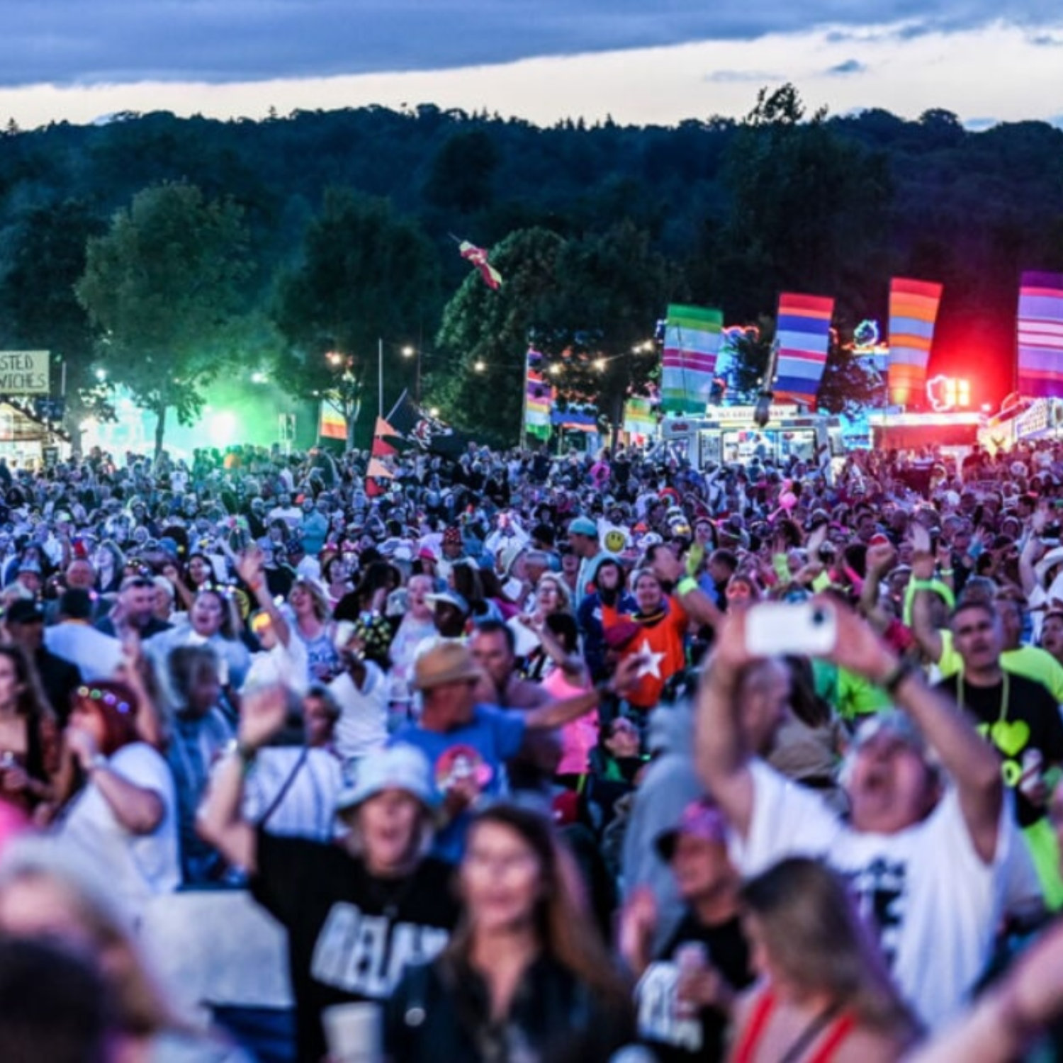People enjoying themselves at concert after getting Marathon Buses to St Annes Park Concerts